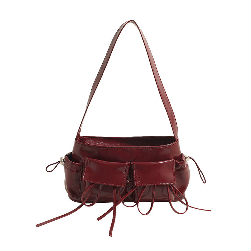 Lakovaná kožená crossbody kabelka