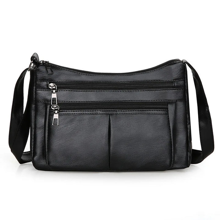 Kožená crossbody kabelka s viacerými vreckami