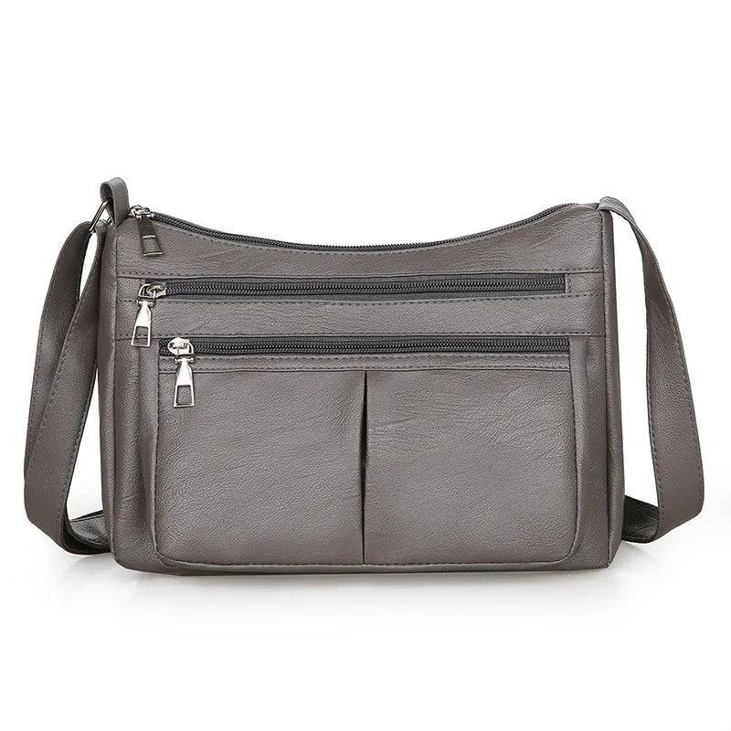 Kožená crossbody kabelka s viacerými vreckami